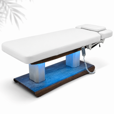 Ambient Electric Treatment Table with white upholstery and illuminated blue base
