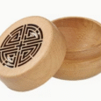 Wooden essential oil diffuser with decorative carved lid