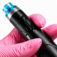 Close-up of Booster Handle blue treatment tip and handheld controls