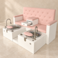 Pink double pedicure chair with twin basins and centre storage