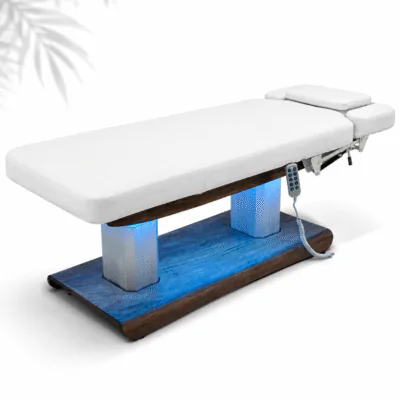 Ambient Electric Treatment Table with white upholstery and illuminated blue base